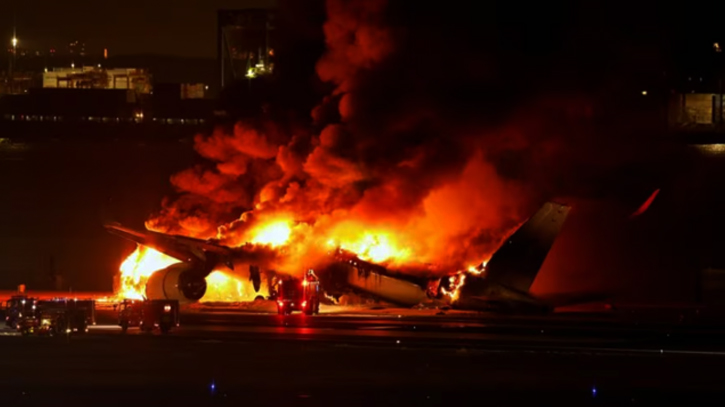 Plane catches fire on runway at Japan’s Haneda airport