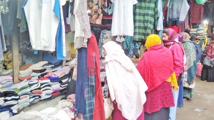 Sale of winter clothes picks up at Gaibandha makeshift shops