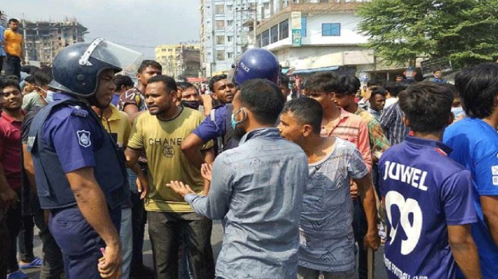 Police use tear gas shells as RMG workers protest in Gazipur