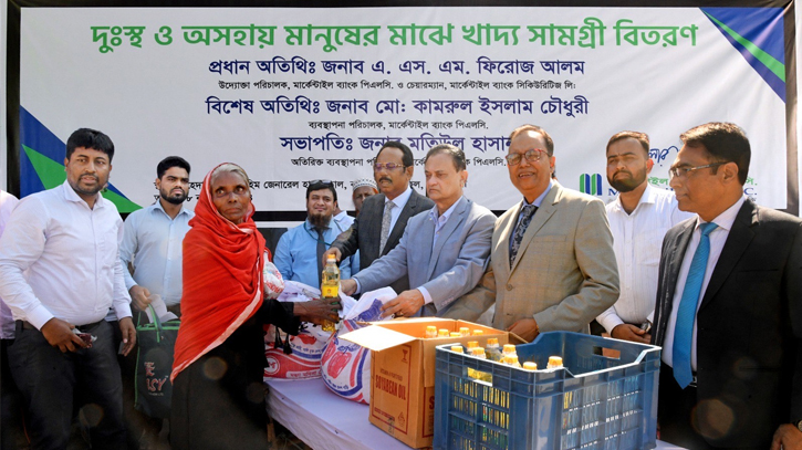 Mercantile Bank distributes food items to 900 families