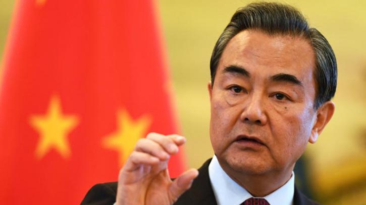 China will ’play along to the end’ with US: Wang Yi