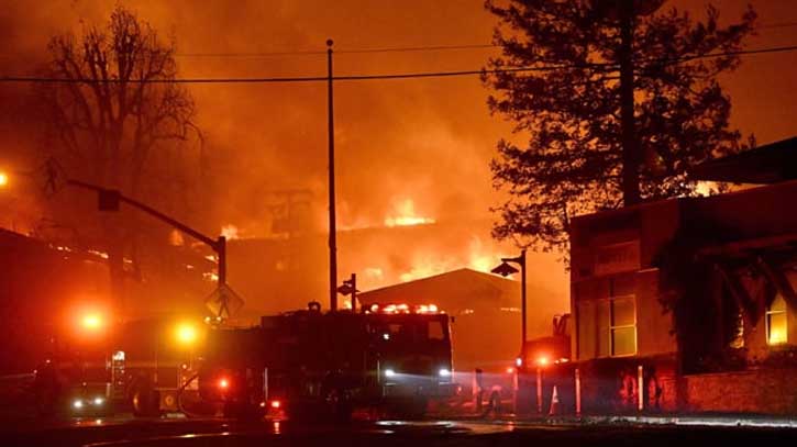 Whole streets burn as fires rage around Los Angeles