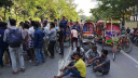 Battery-run rickshaw drivers cripple rush hour traffic to protest ban