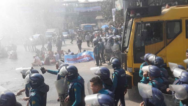 Police charge batons, lob sound grenade to disperse protesting school teachers