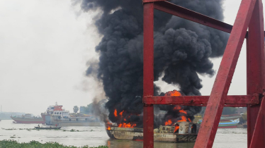 Fire burst out from a vessel into Buriganga