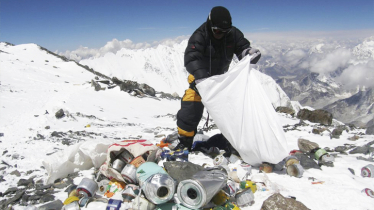 Everest’s Apex Camp littered with frozen garbage, cleanup takes years