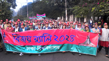 Dhaka University teachers, staff bring out victory procession