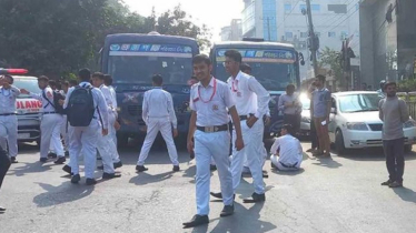 Students block Mirpur Road demanding merit-based admissions