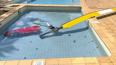 Pilot of helicopter that crashed on Australian hotel roof