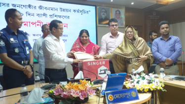 Sewing machines and cash distributed among underprivileged people