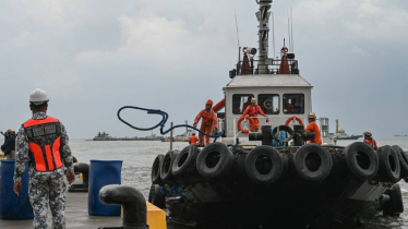 Divers attempt to reach sunken Philippine oil tanker