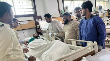 Tarique Rahman provides medical aid to student movement injured