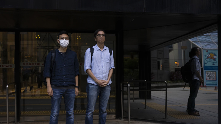 A Hong Kong court convicts 2 journalists in a landmark sedition case