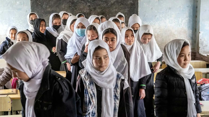 Afghan schools restart, with girls barred for third year running