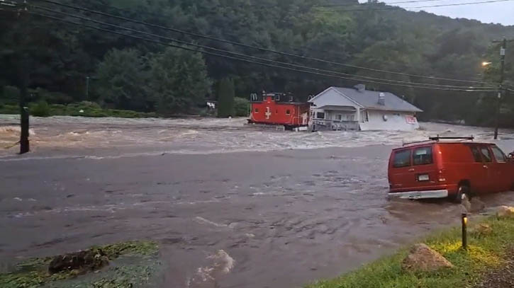 ‘Unprecedented’ flooding kills two in Connecticut