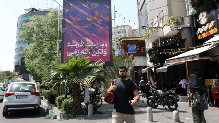 Iran, Israel appear to pull back from brink as US approves military aid