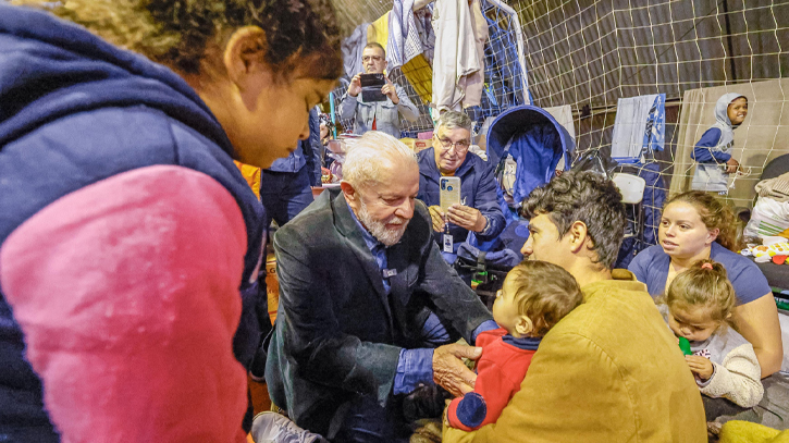 Brazil announces aid to families as Lula visits flooded south